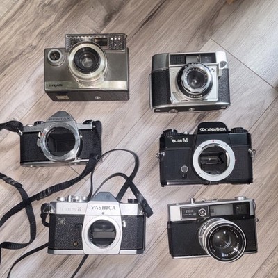 Lot of 6 35mm Film SLR Cameras that are Not Working ( for parts only )