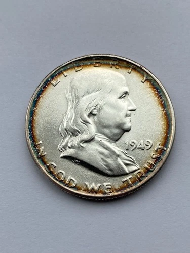 1949 p Franklin Half Dollar - Nice Unc. Edge toning / toned