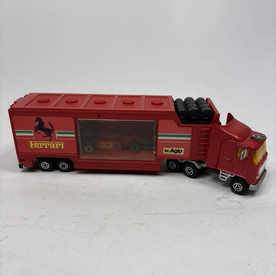 MAJORETTE SUPER MOVERS Camion FERRARI F1 TEAM TRANSPORTER + Auto 3065 Vintage #1 - Immagine 2 di 4