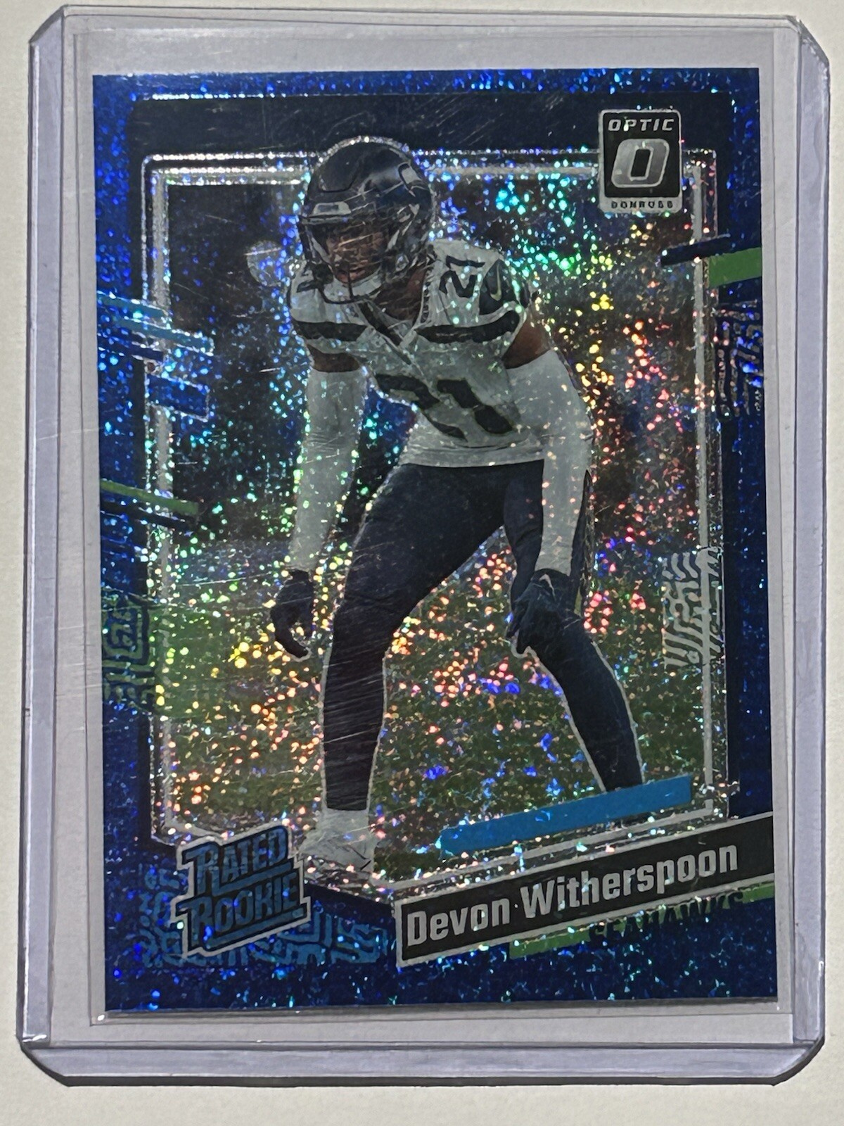 Devon Witherspoon 2023 Optic Rated Rookie Blue Glitter Prizm #292 (RC) Seahawks