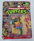 S-398 VINTAGE 1980'S TEENAGE MUTANT NINJA TURTLES LEATHERHEAD MINT ON CARD
