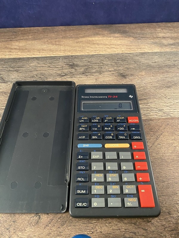 Texas Instruments TI-34 Calculator Pre-Owned with cover WORKING