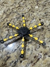 Foldable Spinning Toy Black/Yellow Great Condition See Pictures