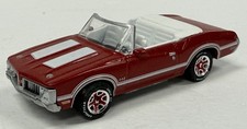 Johnny Lightning 1969 Oldsmobile Cutlass Convertible Red
