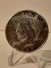1923 S PEACE SILVER DOLLAR IN CHOICE BU CONDITION IN CLEAR HOLDER