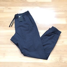 nike standard fit tapered leg pants