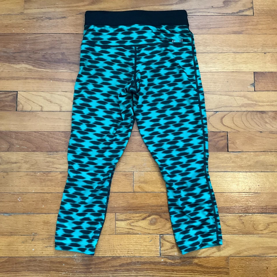 Medias recortadas para correr Nike XS Dri-Fit para mujer entrepierna 19,5" bolsillo con cremallera Foto 2 de 4