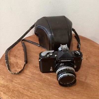 Nikomat /NIKKOR H 1:1.2 f=50mm (良品） s-l400.jpg