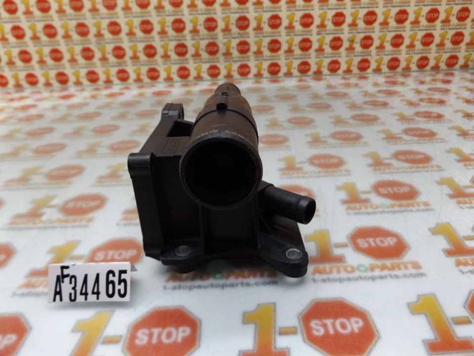 Ford Focus 2003-2007 termostato salida refrigerante crossover 6S4Z-8K556-A OEM Foto 4 de 4