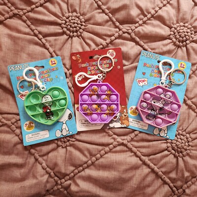 Push Pop Squishers Charlie Brown, Snoopy, Tom & Jerry Keychain backpack clip. 