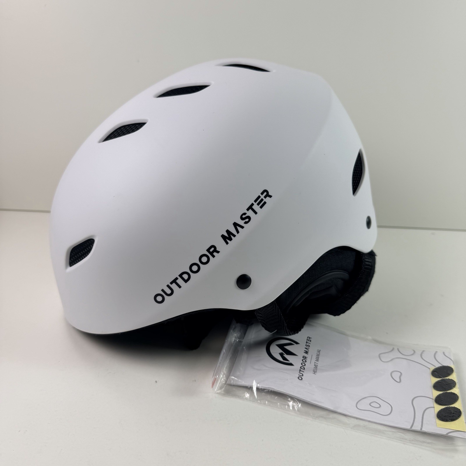 OutdoorMaster Kelvin Ski Snowboard Helmet White Large 22-24 in