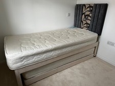 Extendable single bed (very good condition) suitable for 2 adults when extended.