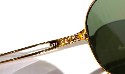 Oakley CAVEAT Shiny Gold w POLARIZED Galaxy Violet Womens Lens