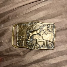 This is a vintage BTS Solid Brass Deer in the Woods Belt Buckle likely from 1978
