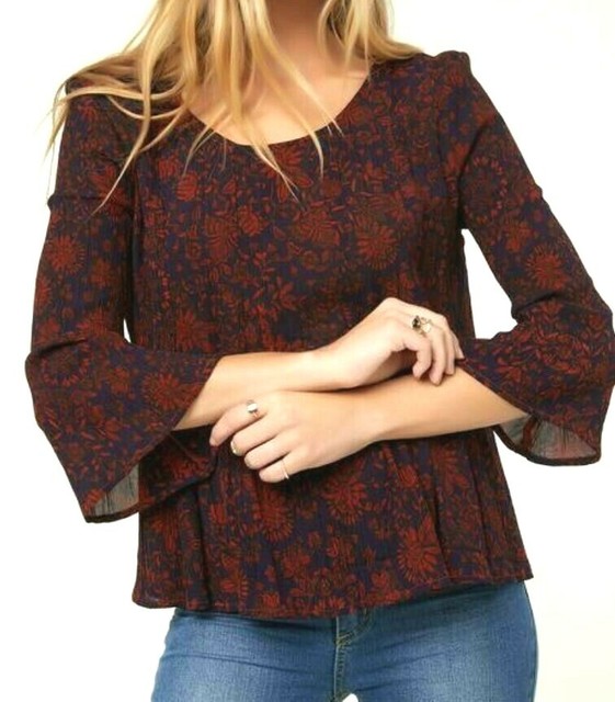 red flowy blouse