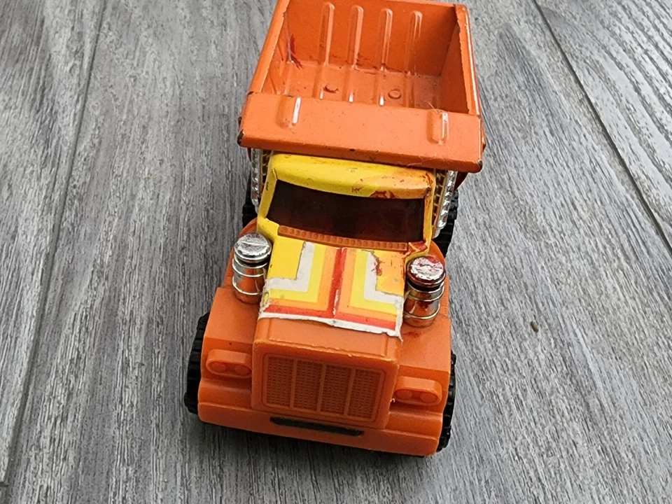 Vintage ERTL Pressed Steel / Plastic Dump Powerized Truck Friction Motor Orange - Image 2 of 4