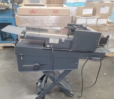 Strate Flo envelope feeder