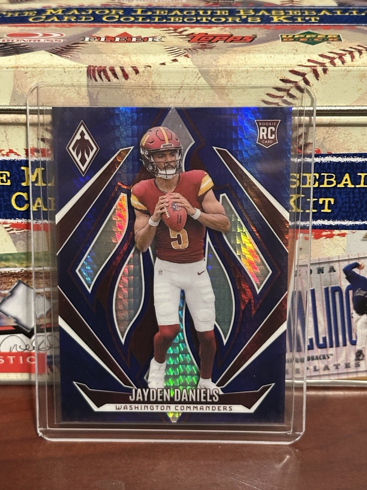 2024 Panini Phoenix JAYDEN DANIELS RC #198 BLUE HYPER /70 SSP COMMANDERS Rookie