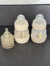 MAM newborn 130 ml feeding bottles with 0 teat plus 4 extra teats
