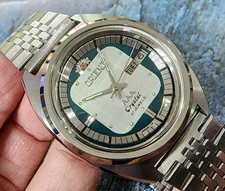 RARE Vintage Orient Automatic Silver Dial gents Facet Crystal Mint.