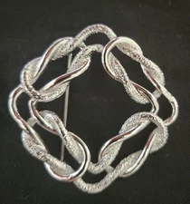 VINTAGE - SIGNED EMMONS - SILVER TONE SLIP KNOT BROOCH