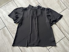 Women’s size medium black Express tie neck flutter sleeve tops