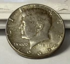 1969-D Kennedy Half Dollar 40% Silver - AU About Uncirculated.
