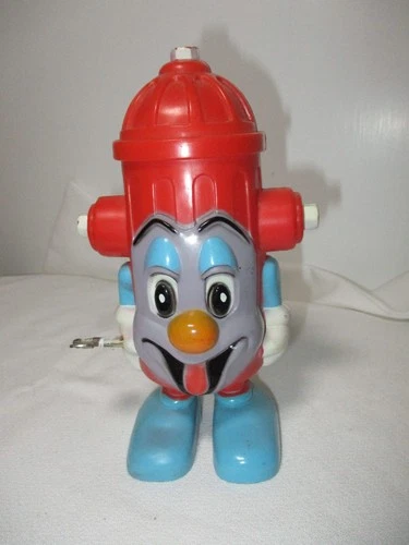 VINTAGE MARX HARD PLASTIC WIND-UP MAGIC MARXIE FIRE HYDRANT WALKING TOY