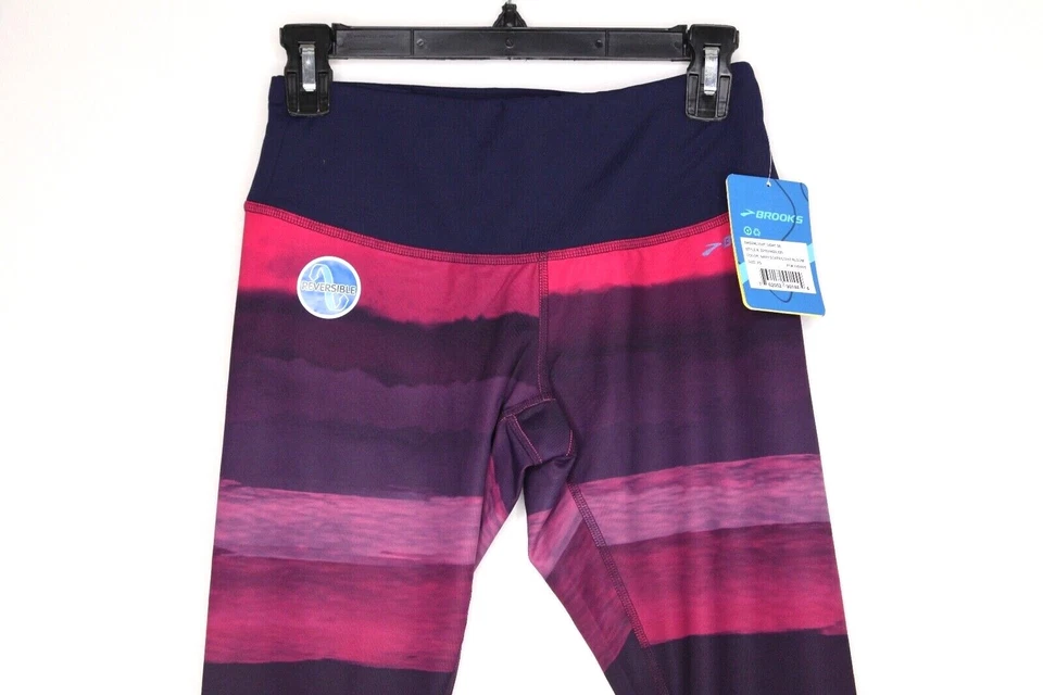  Pantalones de mujer Brooks reversibles Greenlight Tight SE NUEVOS CON ETIQUETAS azul marino paisaje/flor claro XS Foto 2 de 4