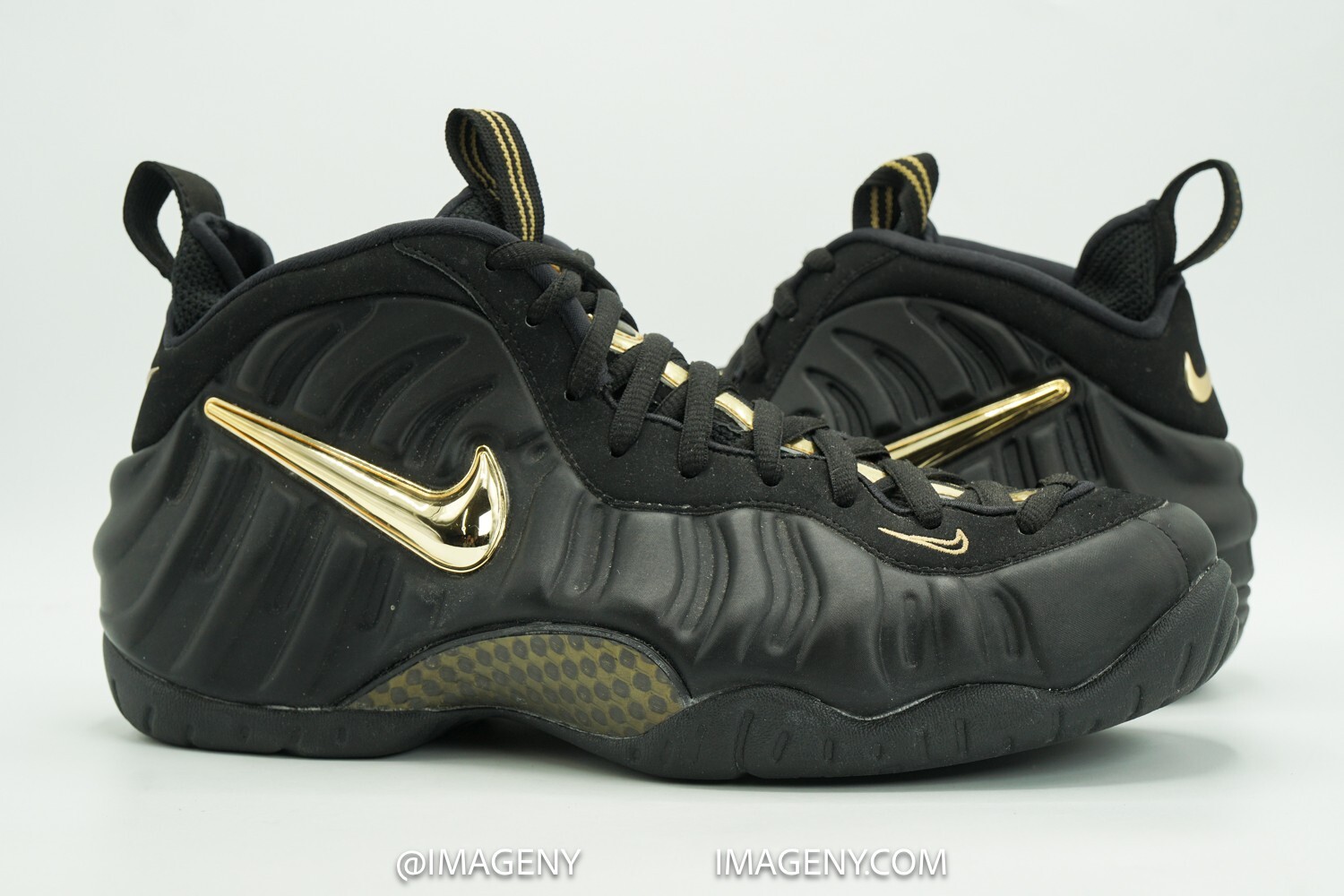 nike foamposite pro black metallic gold