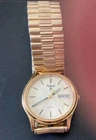 Vtg Pulsar by Seiko Y148-6019 Day/Date Gold Tone Watch 34mm- for parts or repair