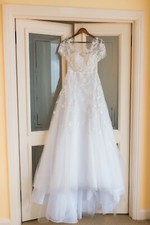 Carolina Herrera wedding dress Street size 8 pre owned. Dagma Gown