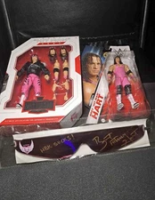 Bret Hart WWE Ultimate Edition Signed Collectible Figures And Glasses