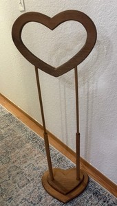 Vintage wooden heart-shaped quilt or blanket stand,