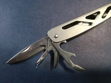 9  Multi Utility Tool No brand name.  no scratches, excellent condition