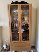 SOLID OAK DISPLAY CABINET  WITH GLASS DOORS AND TWO DRAWERS
