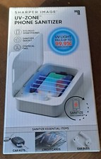 Phone Car Keys Ear Buds credit Card Sanitizer And Charger Sharper Image Uv Zone