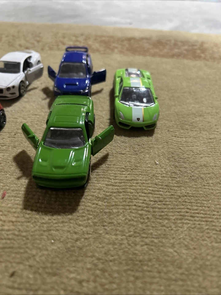 Lote de 9 autos diecast Majorette sueltos 1:64 con piezas móviles Subaru, Porsche, etc. Foto 3 de 4