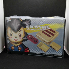 The limited Gold edition Retro Freak controller adapter set — a collector's variant of the definitive multi-system retro console from Japan.