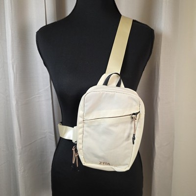 ZYIA Active Crossbody Sling Bag Cream Beige Mini Backpack Athletic Travel