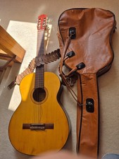 vintage acoustic guitar used