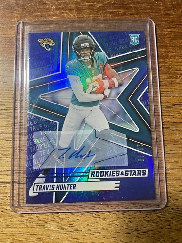 TRAVIS HUNTER 2025 Panini Rookies & Stars No. 186 True Blue Auto #/99 - Jaguars