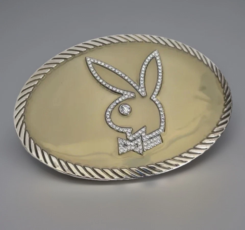 Hebilla de cinturón vintage Playboy Bunny estrás y resina esmaltada tono dorado y plateado. Foto 3 de 4