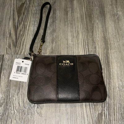 COACH SIGNATURE PVC LEATHER CORNER ZIP WRISTLET (SMALL) IN BROWN