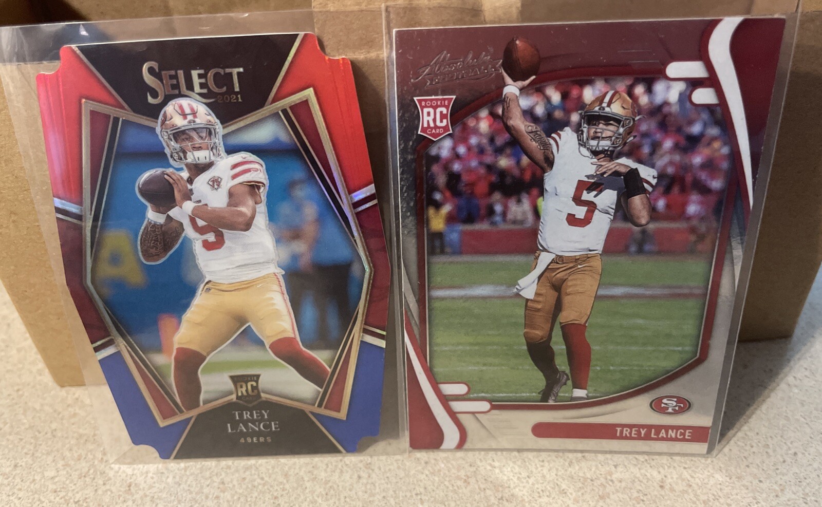 2021 Panini Select NFL Premier Level RC #145 Trey Lance Die-Cut Prizm Red/Blue