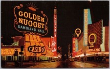 c1960s LAS VEGAS, Nevada Postcard FREMONT STREET Night Scene / Casino Signs