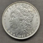 1887 - Morgan Silver Dollar - 90% Silver - SOLID GRADE COIN