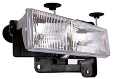 1590000 Headlight Assembly Fits Select Cadillac / Chevrolet / Driver Side