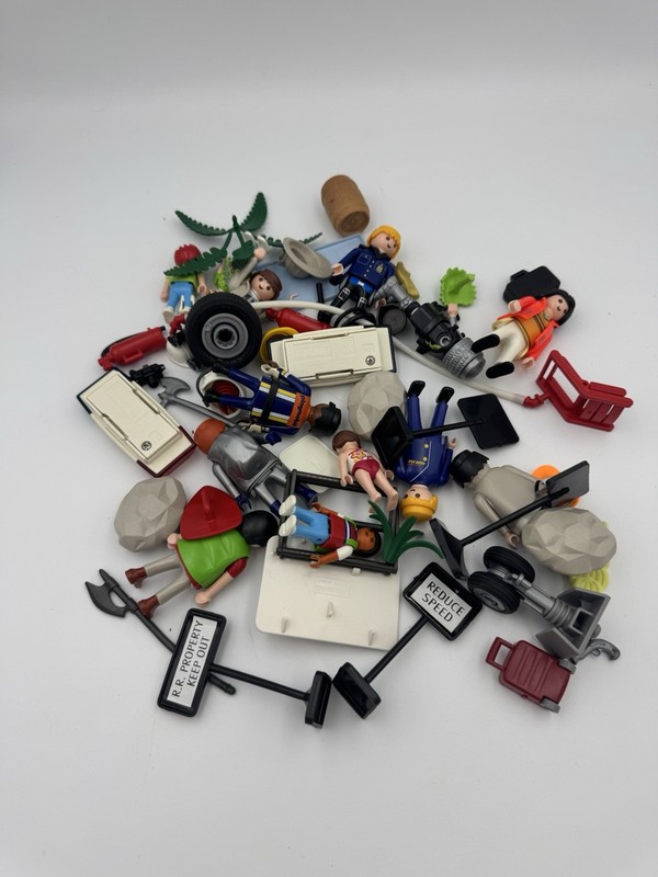 Mixed bulklot of Playmobil Figures and Parts: Police, Knights, Rocks, Signs etc.