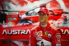 Ferrari driver Michael Schumacher of Germany in the garage at pra- 2004 Photo 3